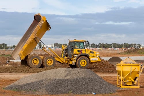 Heavy construction vehicle working on a job site